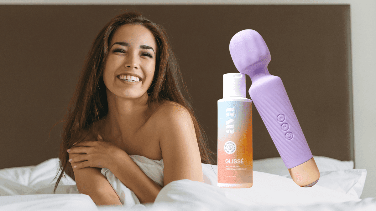 Ava Vibrator in blush pink medical-grade silicone with curved ergonomic design on white background