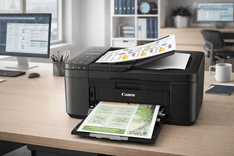Canon PIXMA TR4720 All-in-One Wireless Printer on a home desk printing documents with wireless setup and compact design