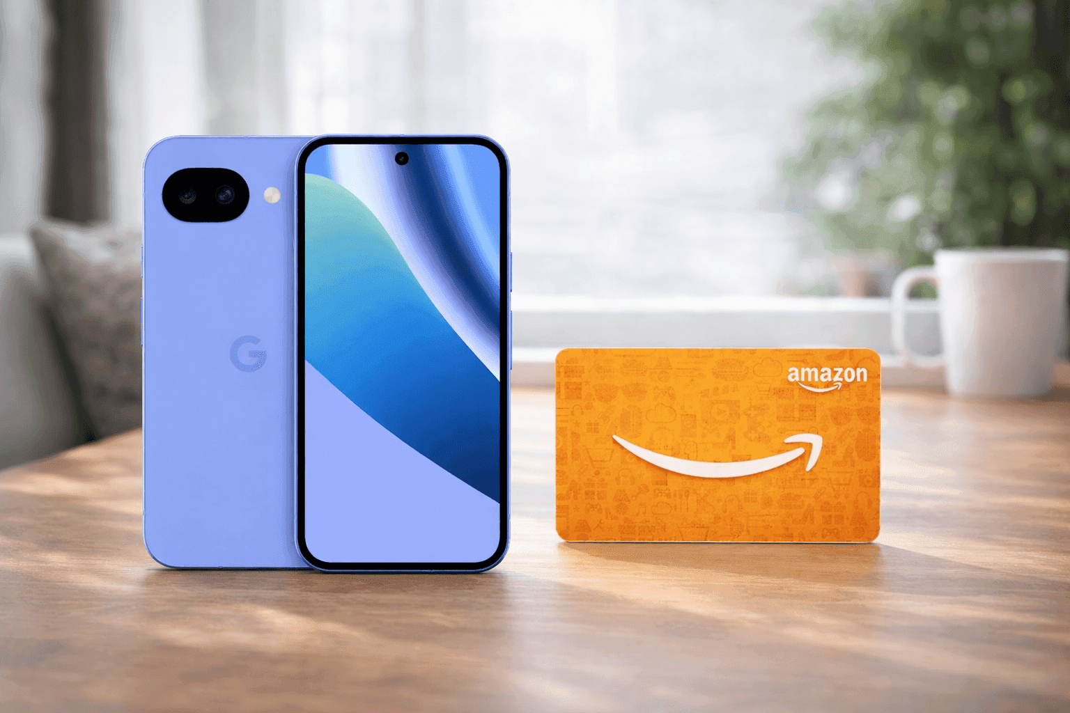 Google Pixel 10a smartphone next to a $100 Amazon gift card on a wooden desk background